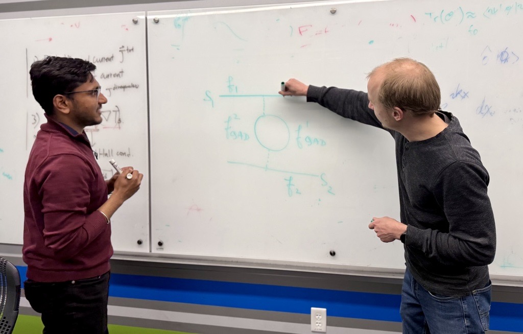Sai and Prof. Jukka discussing the physics of “extended” mesoscopic collider with incoming particles