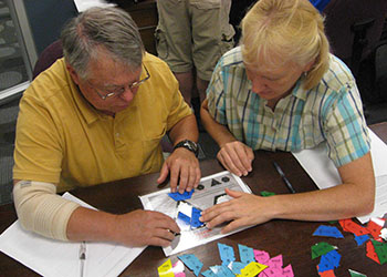 Teachers learning about Purdue physics