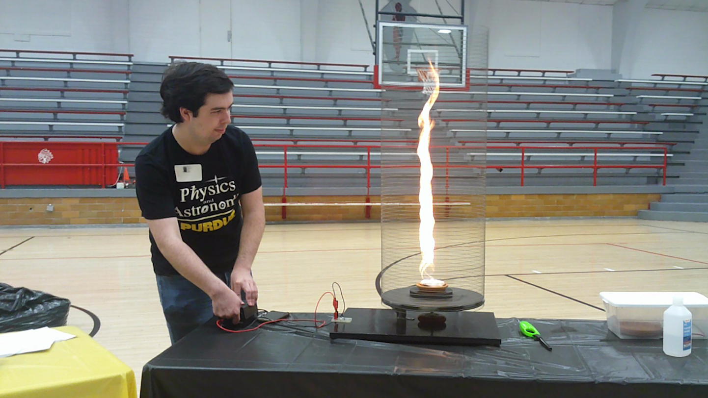 Blowing air making a fire tornado